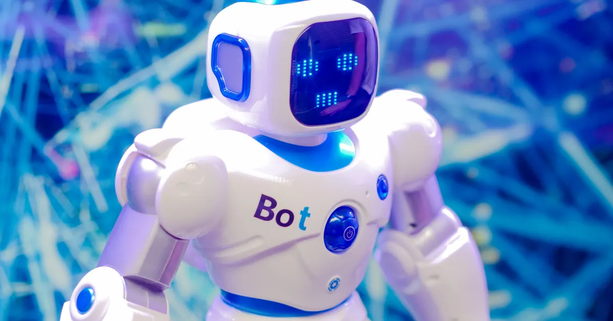 Une machine qui figure un assistant IA, en illustration de la définition SEO de llms.txt